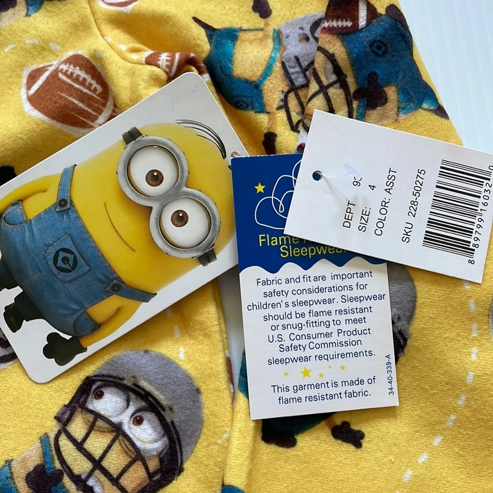 Minions yellow football pajama top & bottoms.  Size 4